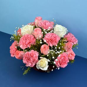 Mixed flowers in basket Mixed flowers in basket