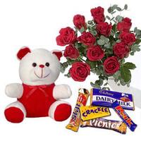 Cute Teddy with rose and chocolates