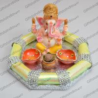 Diyas with Lord Ganesha