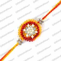 Stone and Pearl Embellished Glitzy Rakhi