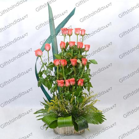 Orange Roses In a Tall Basket