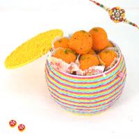 Sumptuous Laddu Delight Basket with Rakhi