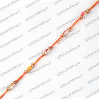 Ethnic Yellow and Red Rakhi With Pearl