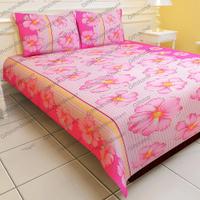 Pink coloured bedsheet with big pink flowers