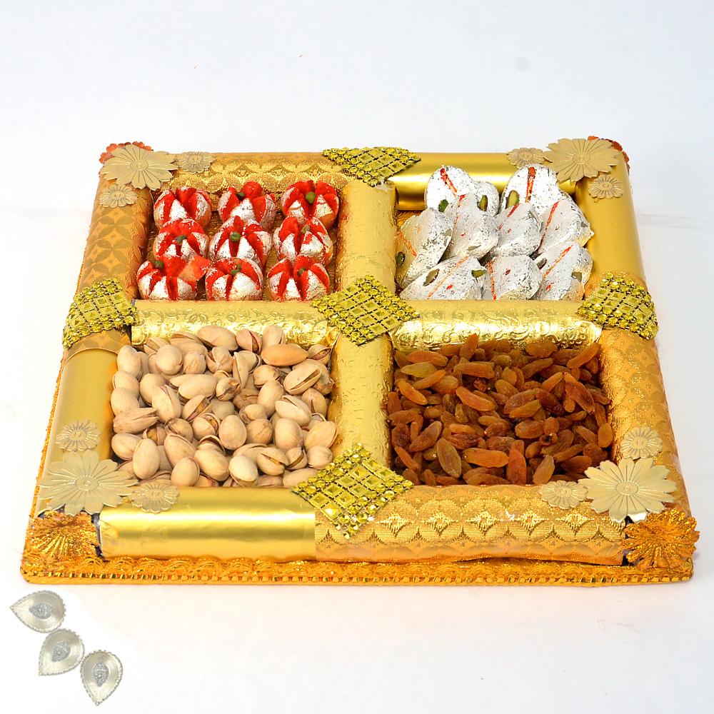 Delectable Hamper of Dry Fruits and Indian Sweet Diwali Diyas