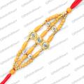 Golden Rakhi with White Stones