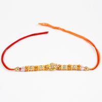 Enthralling Gold and Silver Rakhi