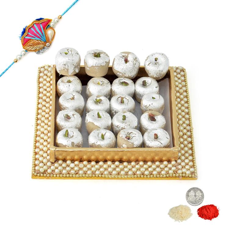 Kaju Sev in a Moti Worked Tray with Rakhi