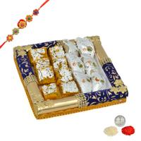 Tasty Sweets in a Blue Tray With Rakhi