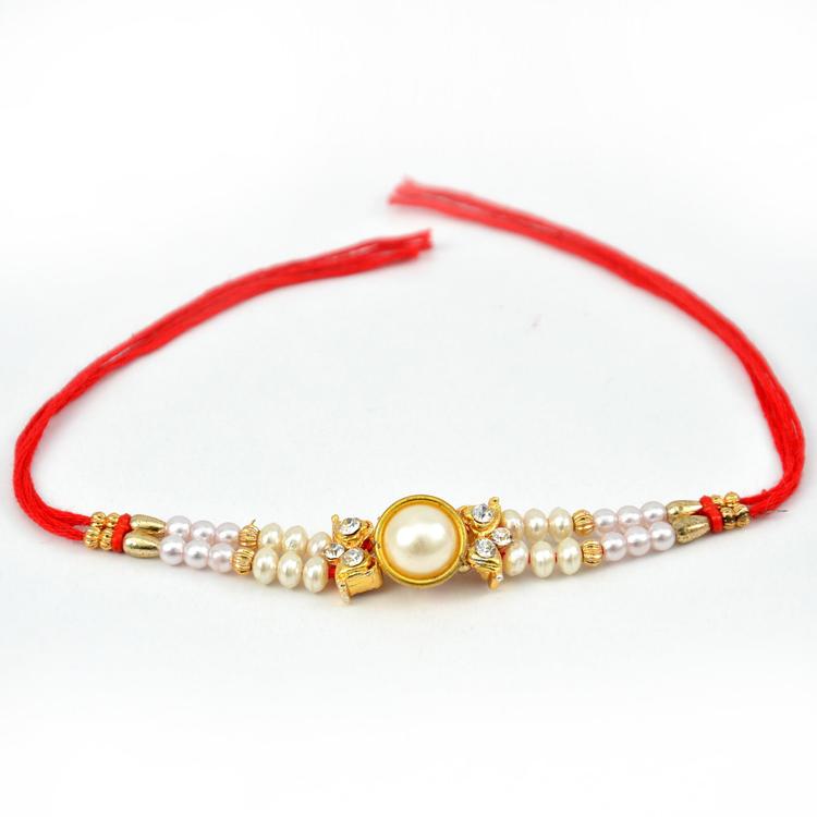 Superb Pearl and Stones Rakhi (Express)