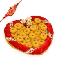 Kesaria Peda In Red Heart Shaped Tray With Rakhi