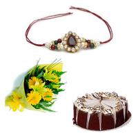 Bunch of Lilies and Chocolate Cake with Rakhi