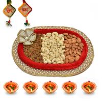 Luscious Dry Fruits in Red Thali with Diya