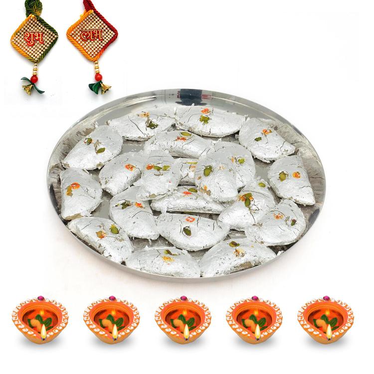 Thali of Delectable Kaju Gujia with Diya