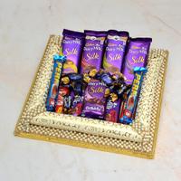 7 pcs Dairy Milk, 2 Perk in a Thali