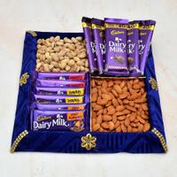 Dry Fruits with Dairy Milk in a Thali