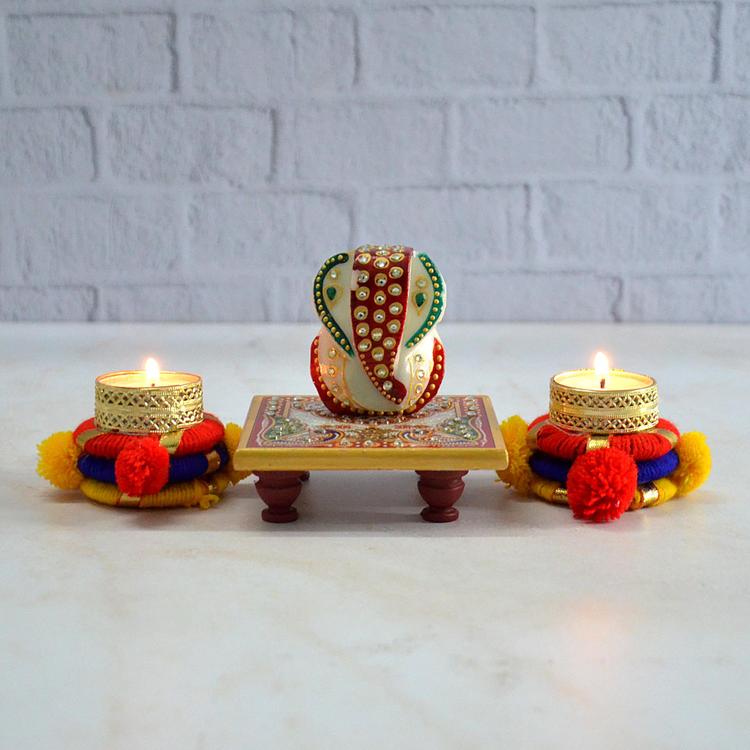 Ganesha on Peacock Chowki with 2 Diya
