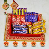 Dairy Milk, Munch & Snickers in a Red Thali