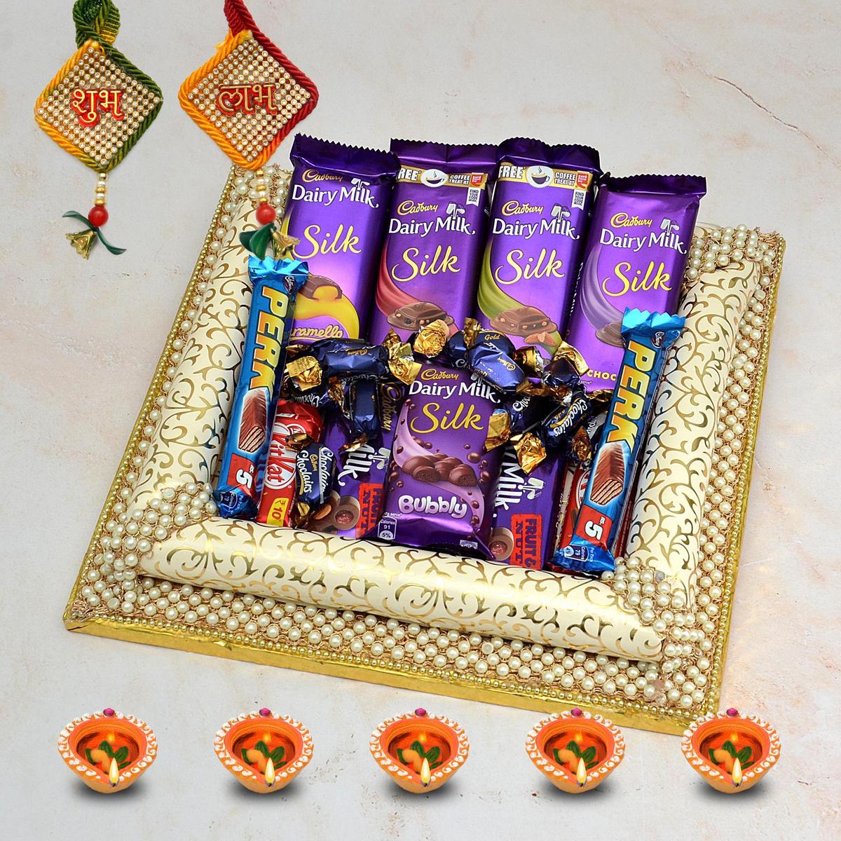 7 pcs Dairy Milk, 2 Perk in a Thali Diwali Gifts