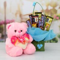 Chocolates Bouquet in a Basket with Pink Teddy