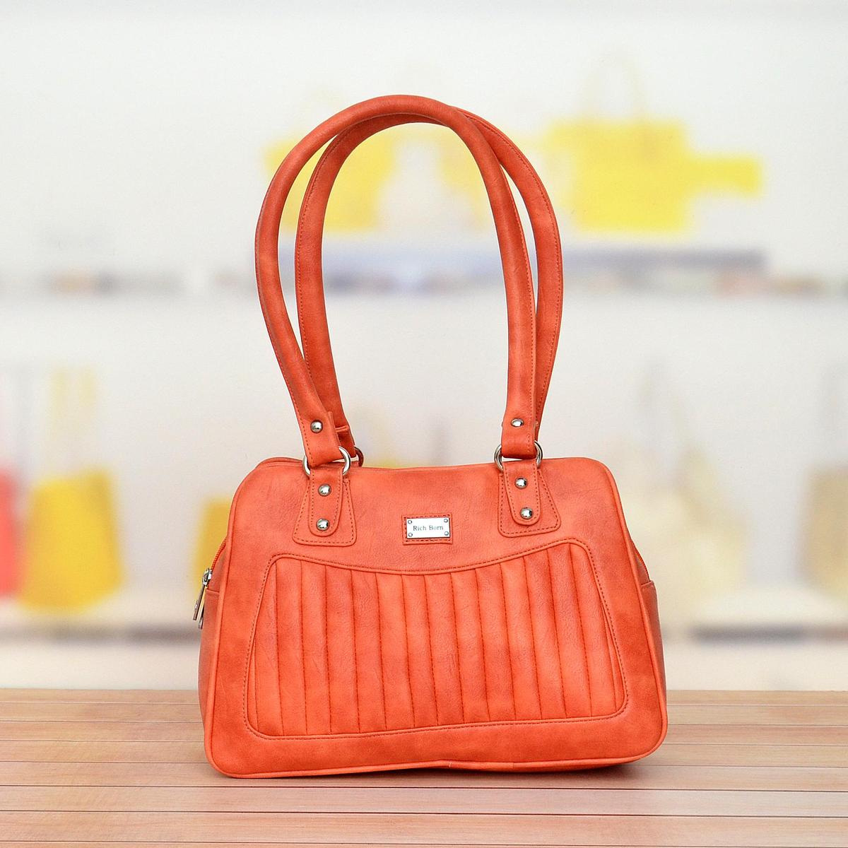 orange designer bag sale