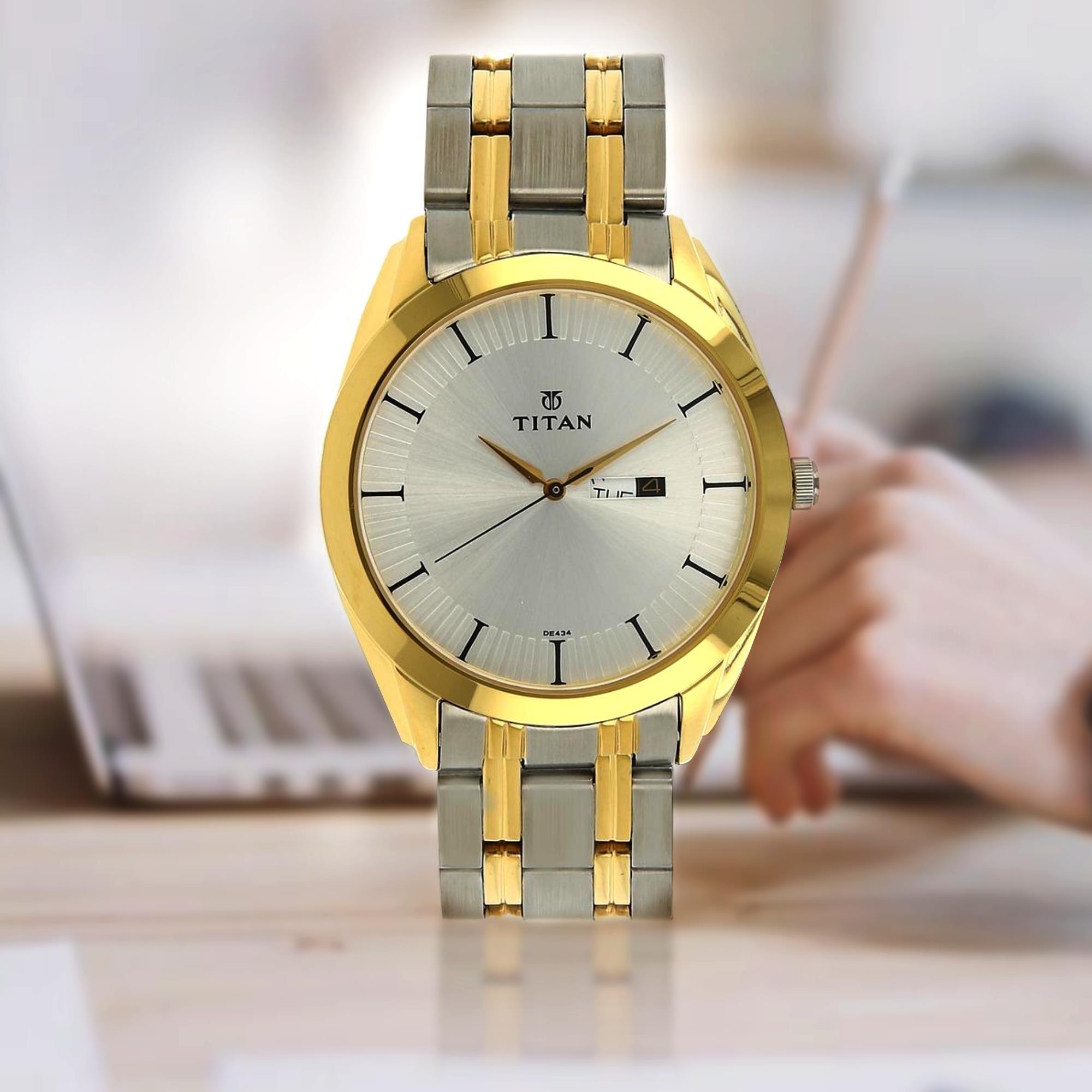 Titan gold and online silver watch