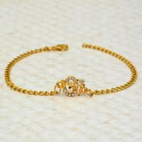 Golden Bracelet with Stone OM Rakhi