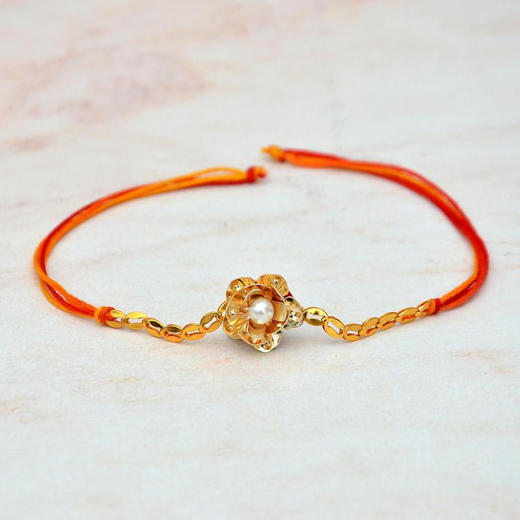 Yellow Metal & Pearl Rakhi