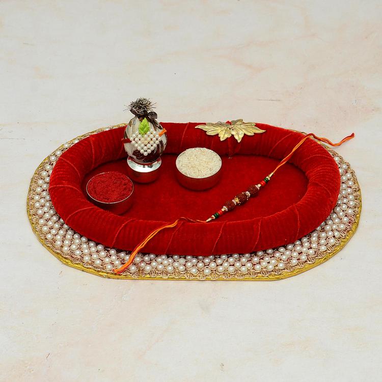 Puja Thali - Oval Red Thali with Rudraksh Rakhi