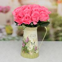 Artificial Pink Flowers In A Antique Flower Pot