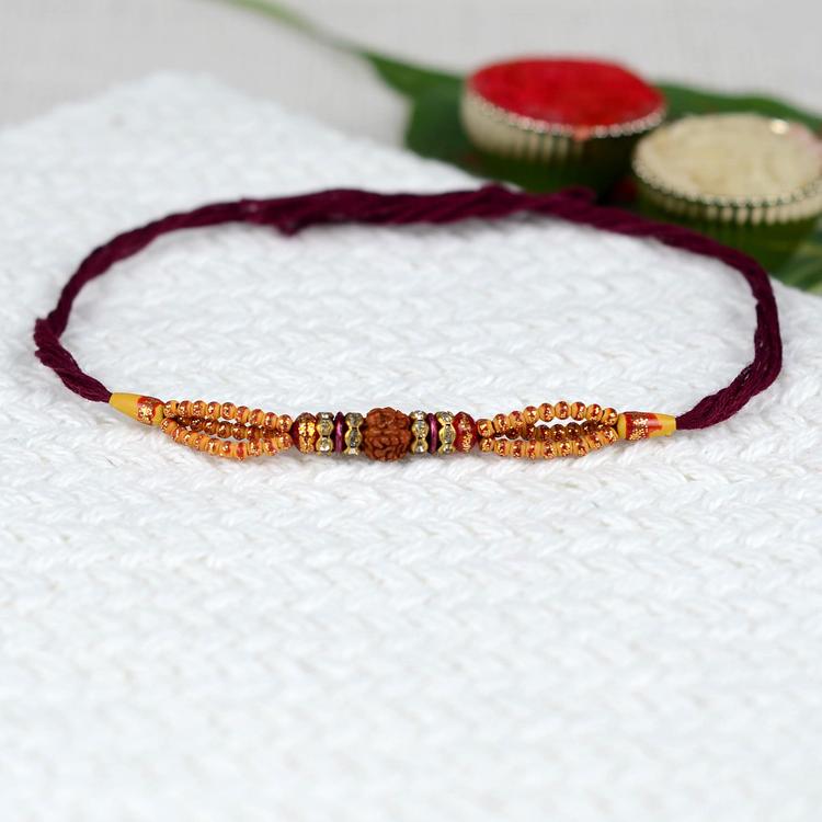 Single Rudraksh Maroon Rakhi