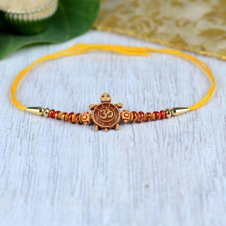 Feng Shui Tortoise Yellow Om Rakhi