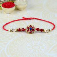 Red Petals and Beads Floral Rakhi