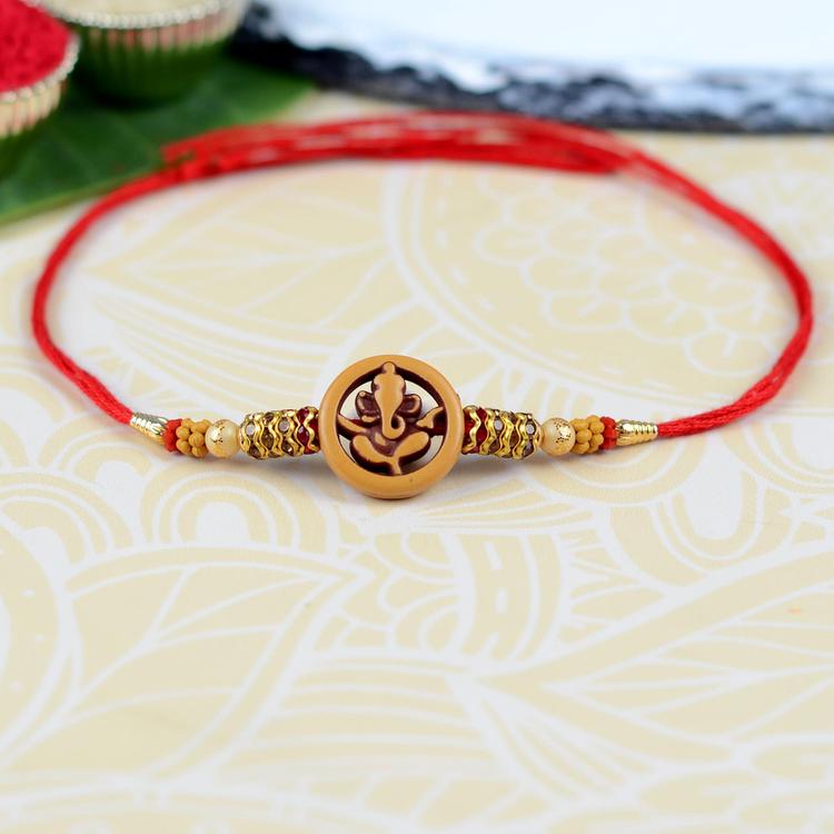 Charming Ganesh Button Rakhi