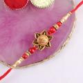 Antique Flower with Varnished Bead Rakhi