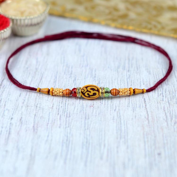 Pleasing Om Rakhi Dori HCP11