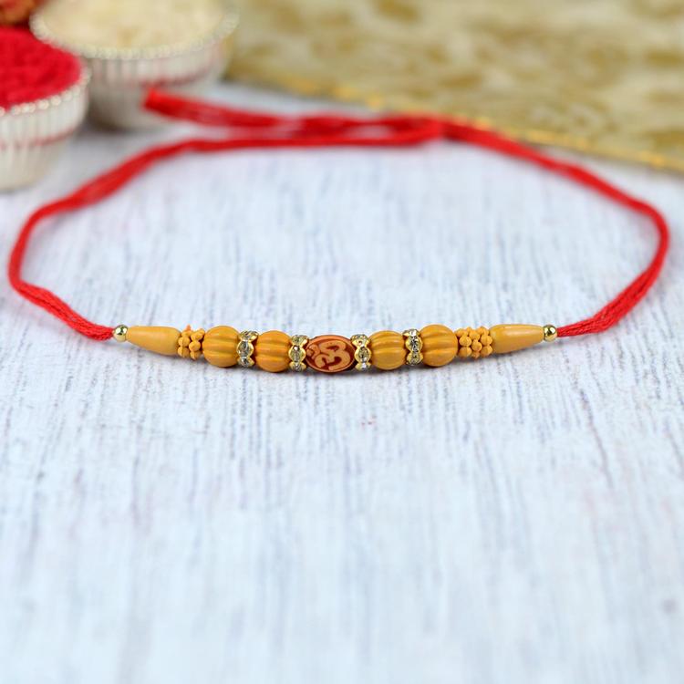 Om Swastik Ochre 316 Rakhi Red