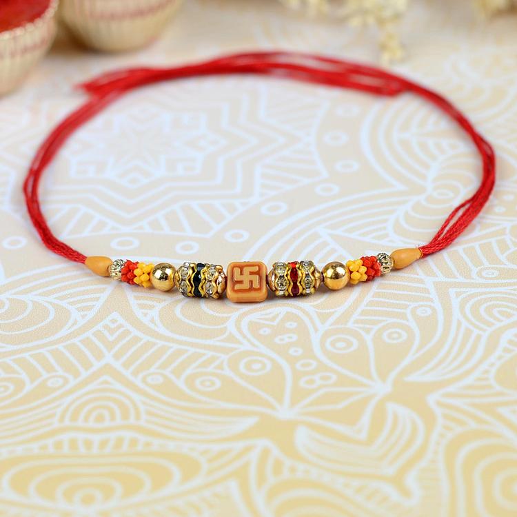 Om and Swastik Rakhi 233 Red