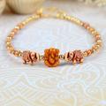 Elephants with Ganesh Rakhi Bracelet