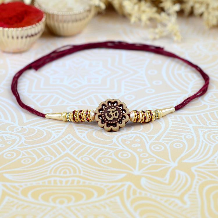 Back to Back Floral Om Rakhi Maroon