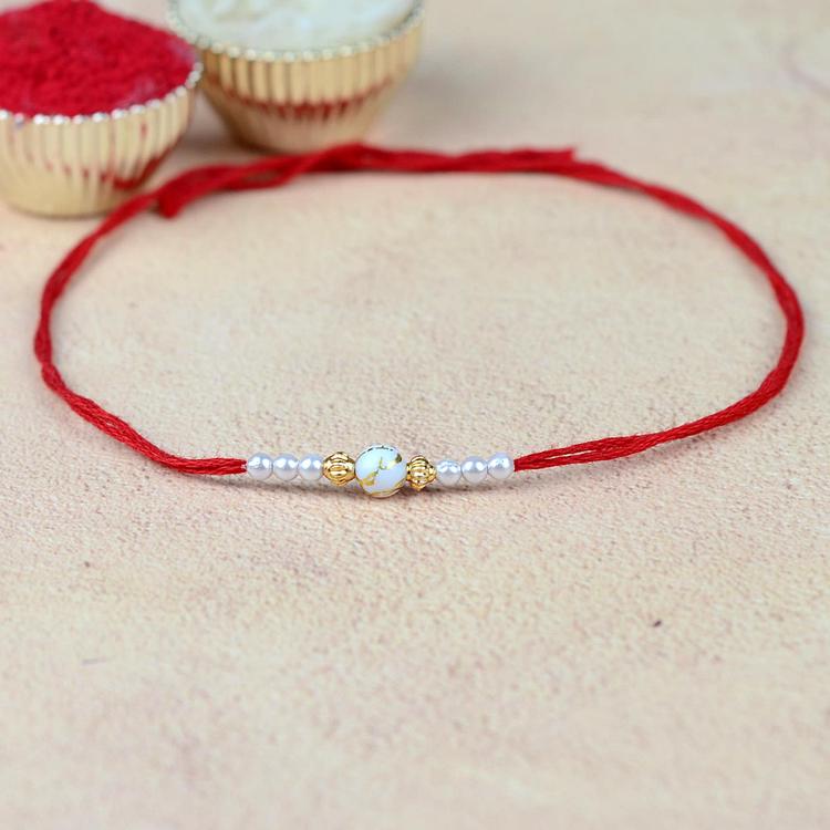 Gold Painted White Bead Rakhi VKP61 Red