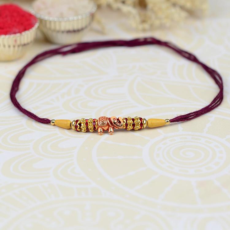 Golden Red Elephant Rakhi 468 Maroon