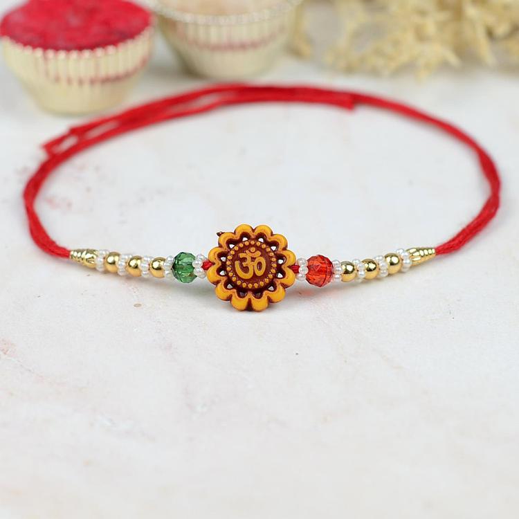 Floral Om 399 Rakhi Red Dori