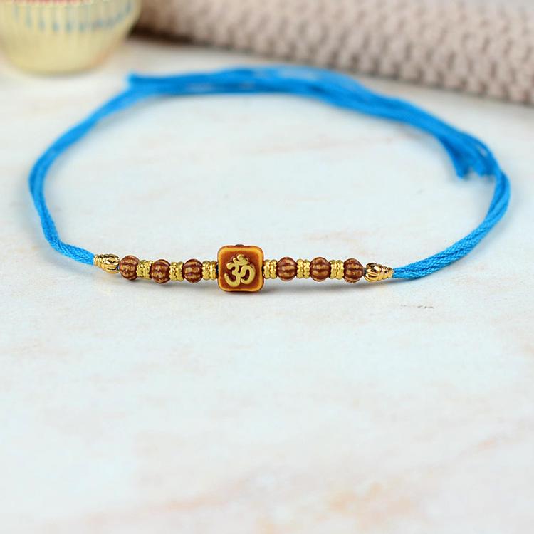 Blue 400 Om and Swastik Rakhi