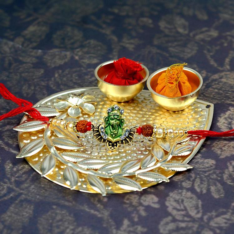 Green Ganesha Rakhi on Leaf Thali With Roli Chawal