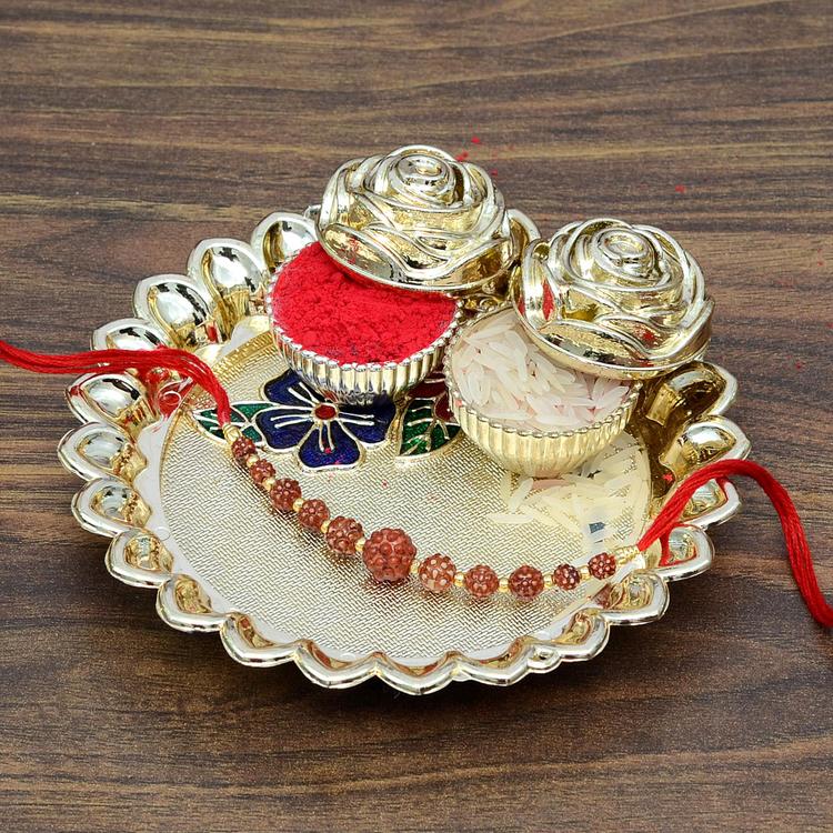 Rudraksha Rakhi on Floral Thali and Roli Chawal