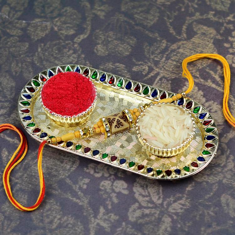 Stylish Om Rakhi on Oblong Thali With Roli Chawal