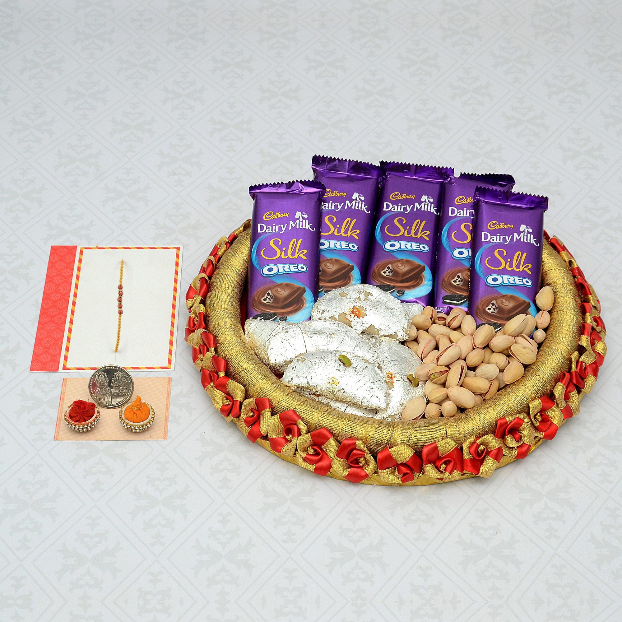 Dairy Milk Silk Oreos Kaju Gujiya and Pista Combo Rakhi Thali Rakhi