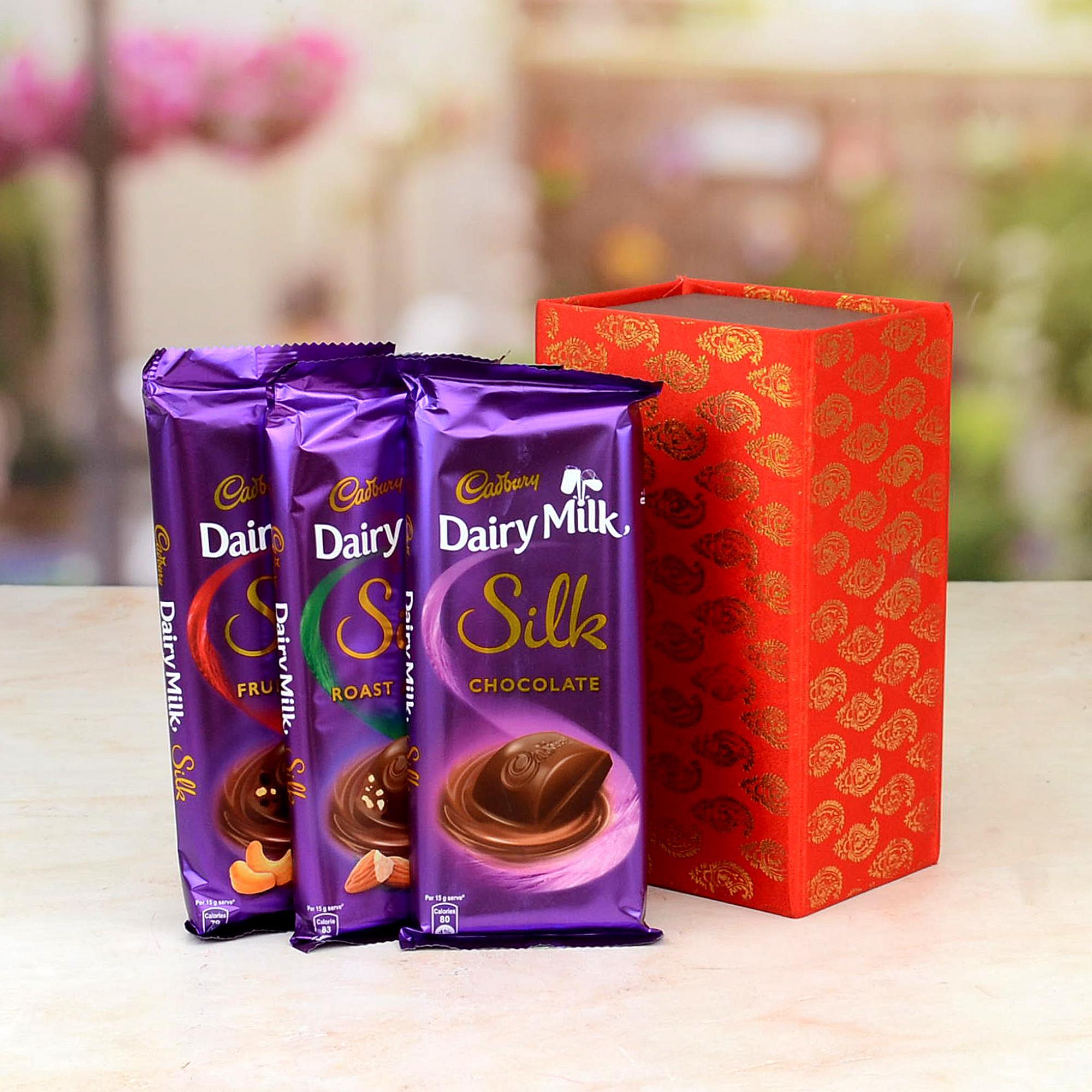 Buy/Send Sneh Lord Ganesha Rakhi & Cadbury Chocolates Online- FNP