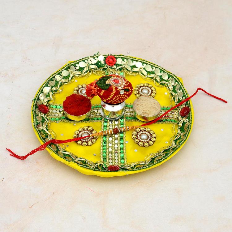 Round Yellow Designer Thali With Rudraksha Rakhi